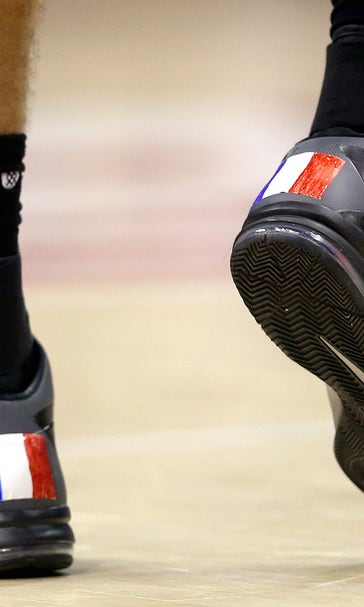 Gobert wears native France on his shoes, then helps Jazz past Hawks